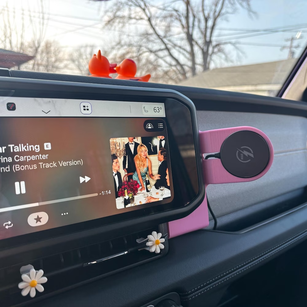 Pink TrailMounts Jeep Wrangler Gladiator phone mount installed in vehicle